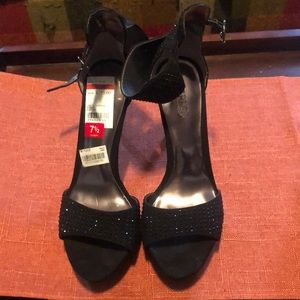 Like new Carlos Santana black jeweled high heels.  Size 7.5